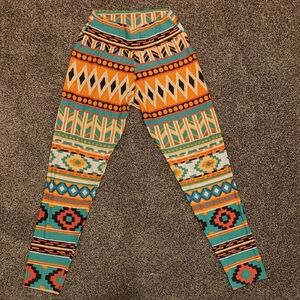 Liquido Vibrant Orange and Yellow Tribal Leggings